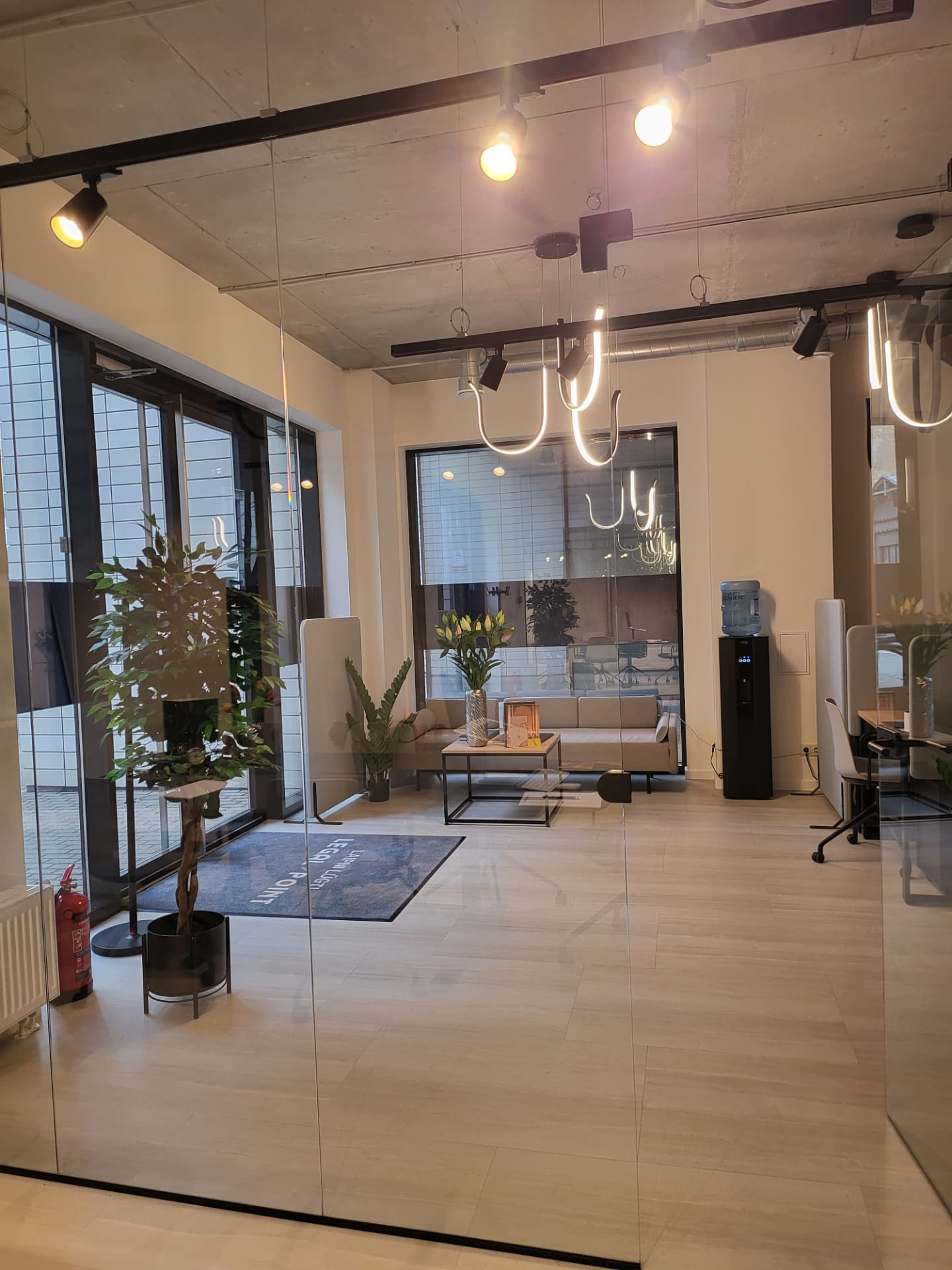 Legal Point office reception in Riga with the Legal Point floor mat